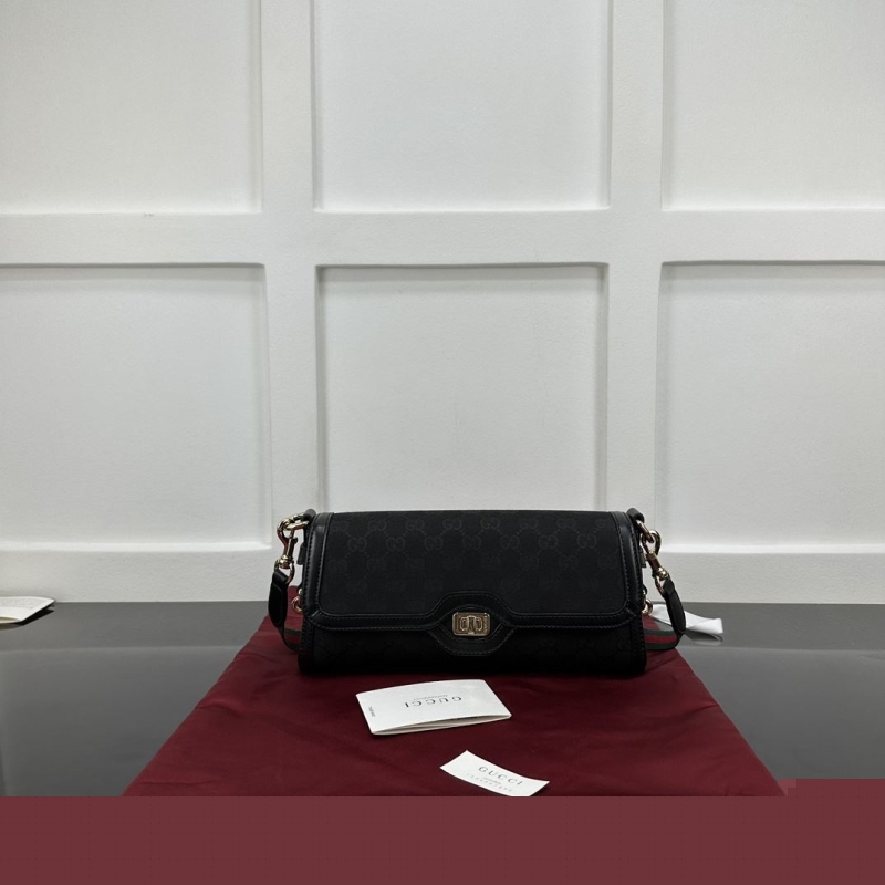 G*u*i satchel bags